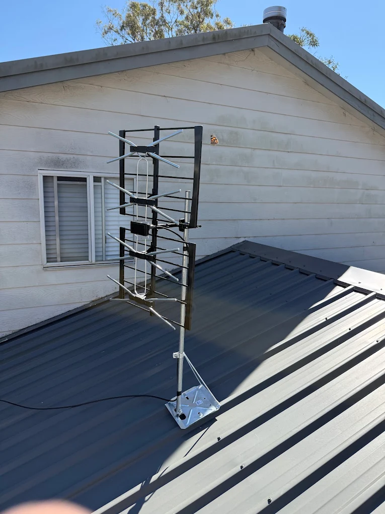 Quality TV antenna installed on a residential home roof